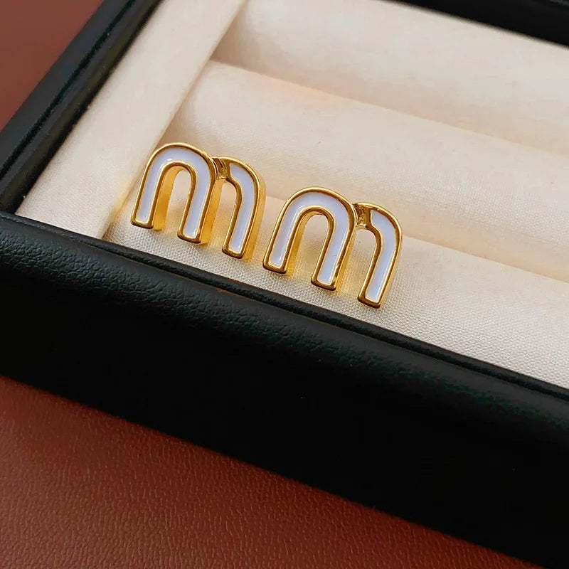 Maria - Drop M Ear Buckle