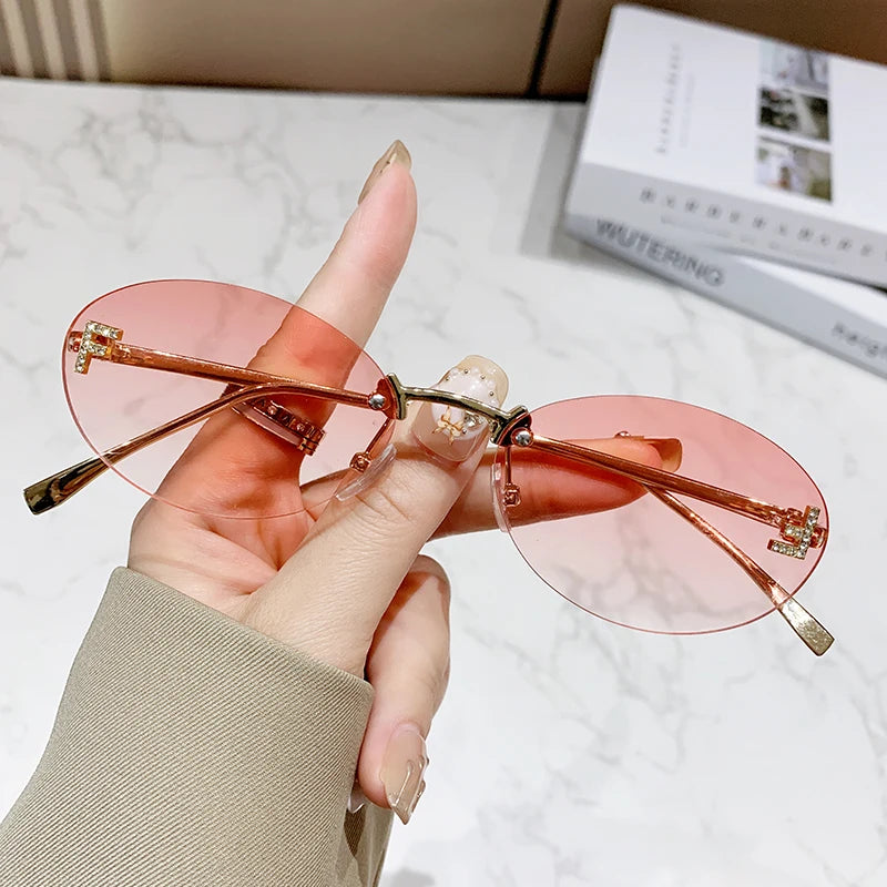 Protective Glasses Fashion Oval Rimless Design Sunglasses Female Small Size Metal Suneyeglass Outdoors Casual Vacation UV400